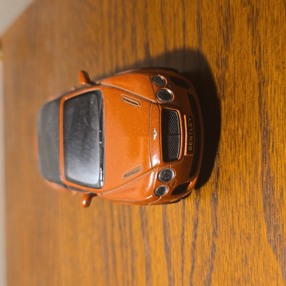 Orange bentley car